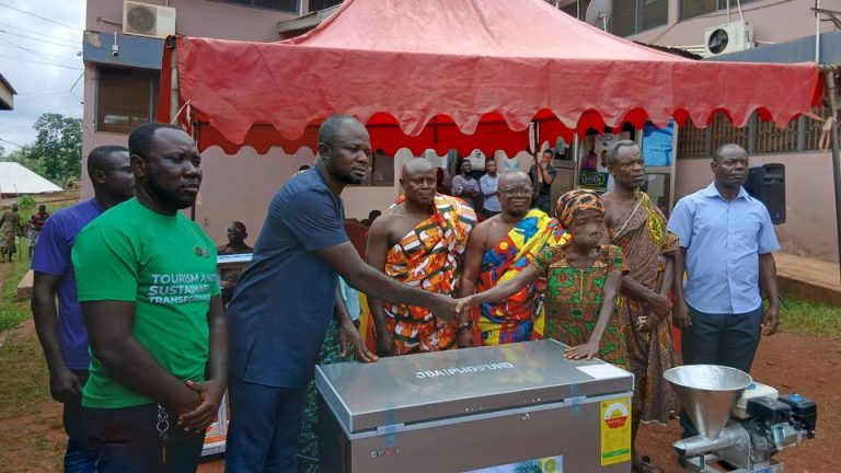 HON. ALEXANDER ADU-QUIST THE DCE FOR JUABOSO DISTRICT PRESENTED ITEMS AND MONEY TO PEOPLE WITH DISABILITIES