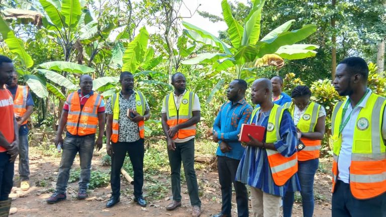 VISIT TO INSPECT A PROPOSED SITE FOR THE CONSTRUCTION OF CHPS COMPOUND AT ADWUMAM BY JUABOSO DCE